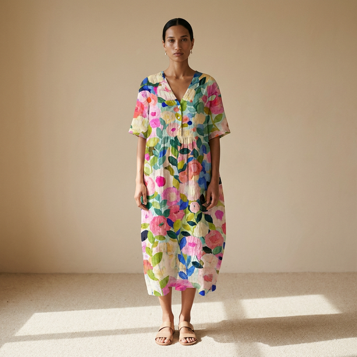 Bloemige midi zomerjurk dames voorkant op model