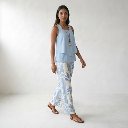 Abigail | Chic Two-Piece Set - model walking front side - master front reference - Higgsfield job e55ee804-3a5c-49f5-81e6-96c108739d14