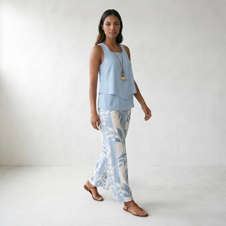 Abigail | Chic Two-Piece Set - model walking front side - master front reference - Higgsfield job e55ee804-3a5c-49f5-81e6-96c108739d14